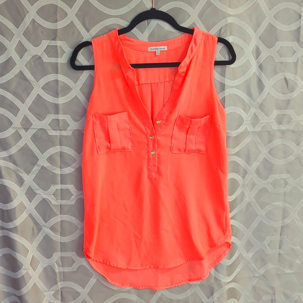 Hot orange sleeveless blouse